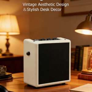 Vintage cream white mini guitar amp acting as a stylish desk decor on a wooden table