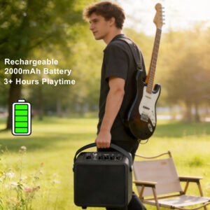 Musician carrying portable rechargeable guitar amp with handle outdoors, 2000mAh battery