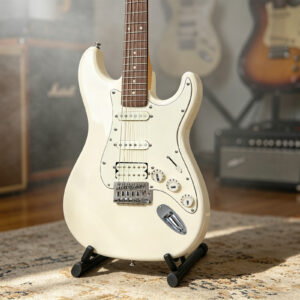 Ranch ST electric guitar showcased on a compact stand inside a music studio