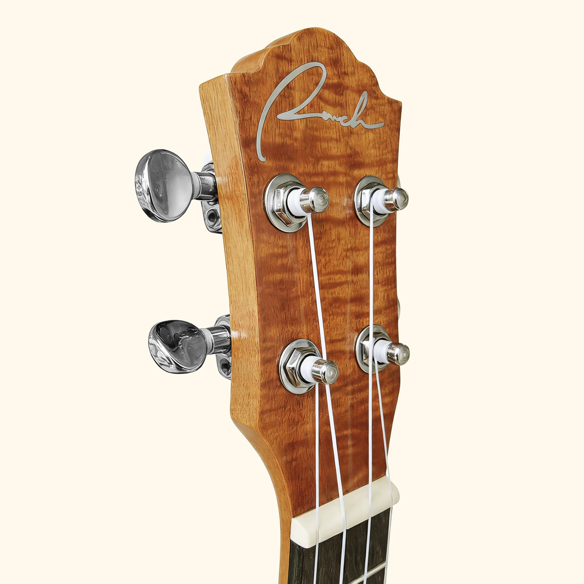Closeup of Ranch 23 inch ukulele headstock with chrome tuning pegs